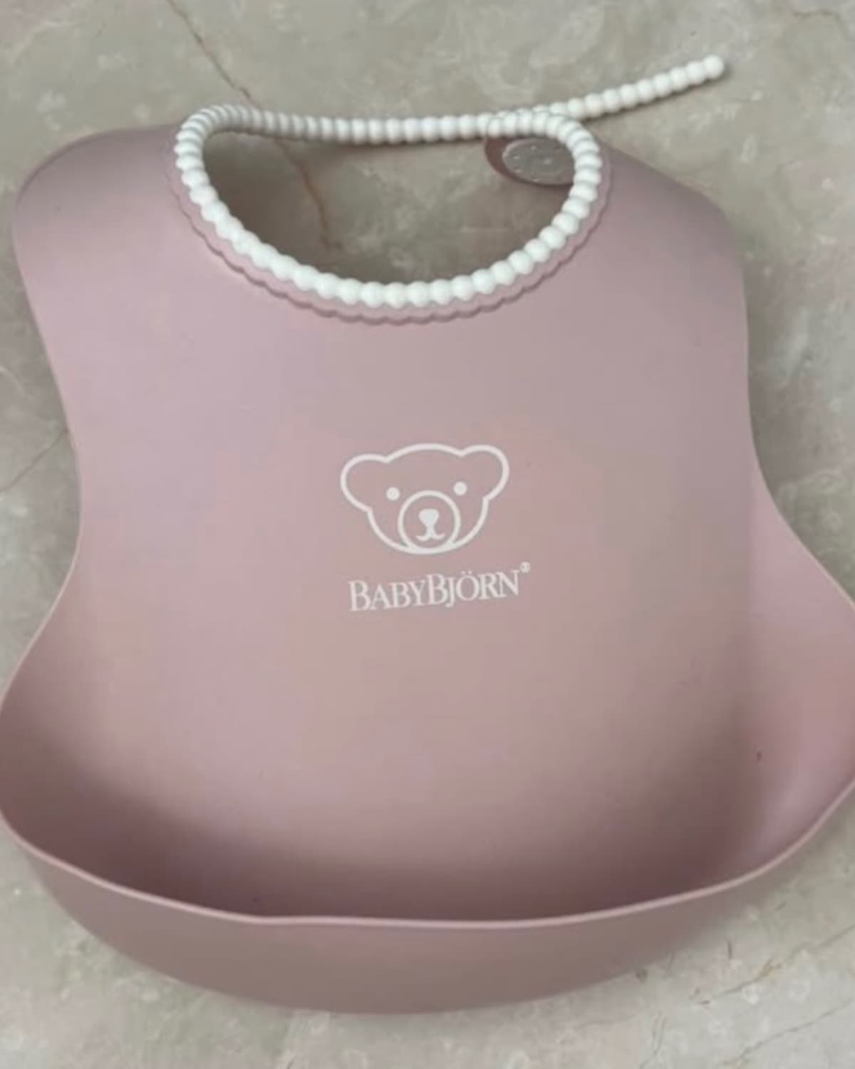 Bavoir Rose plastique